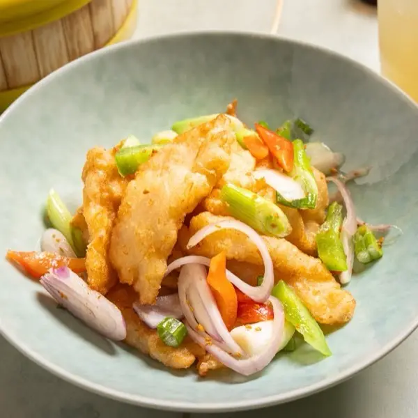 Crispy fried fillet stir-fried with celery, onion and tomato
