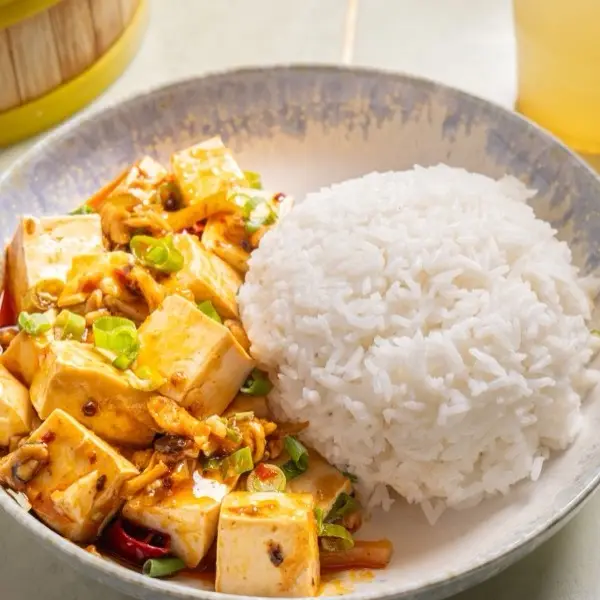 Mapo tofu with minced pork and spring onion, served with steamed rice
