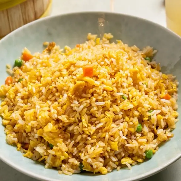 Egg fried rice with peas, carrot and fresh spring onion